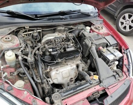 Красный Мицубиси Лансер, объемом двигателя 1.6 л и пробегом 273 тыс. км за 3622 $, фото 5 на Automoto.ua