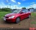 Червоний Міцубісі Lancer, об'ємом двигуна 1.6 л та пробігом 217 тис. км за 3800 $, фото 1 на Automoto.ua