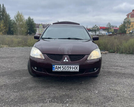 Червоний Міцубісі Lancer, об'ємом двигуна 2 л та пробігом 295 тис. км за 4150 $, фото 1 на Automoto.ua