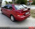 Червоний Міцубісі Lancer, об'ємом двигуна 1.6 л та пробігом 290 тис. км за 4250 $, фото 1 на Automoto.ua