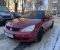 Красный Мицубиси Лансер, объемом двигателя 1.6 л и пробегом 289 тыс. км за 3350 $, фото 1 на Automoto.ua