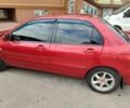 Червоний Міцубісі Lancer, об'ємом двигуна 1.6 л та пробігом 176 тис. км за 4500 $, фото 1 на Automoto.ua