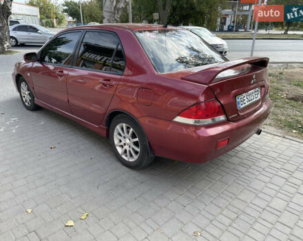 Червоний Міцубісі Lancer, об'ємом двигуна 1.58 л та пробігом 290 тис. км за 4250 $, фото 9 на Automoto.ua