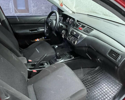 Червоний Міцубісі Lancer, об'ємом двигуна 1.58 л та пробігом 237 тис. км за 4700 $, фото 6 на Automoto.ua