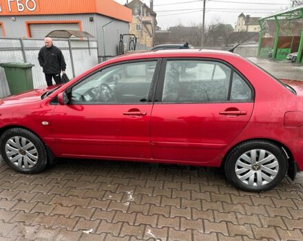 Червоний Міцубісі Lancer, об'ємом двигуна 1.6 л та пробігом 185 тис. км за 5000 $, фото 2 на Automoto.ua