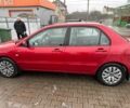 Червоний Міцубісі Lancer, об'ємом двигуна 1.6 л та пробігом 185 тис. км за 5000 $, фото 2 на Automoto.ua
