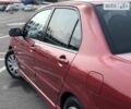 Червоний Міцубісі Lancer, об'ємом двигуна 1.6 л та пробігом 290 тис. км за 4300 $, фото 7 на Automoto.ua