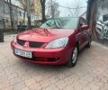 Красный Мицубиси Лансер, объемом двигателя 1.6 л и пробегом 276 тыс. км за 4350 $, фото 1 на Automoto.ua