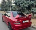 Красный Мицубиси Лансер, объемом двигателя 2 л и пробегом 307 тыс. км за 4500 $, фото 1 на Automoto.ua
