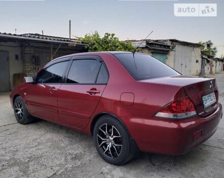 Червоний Міцубісі Lancer, об'ємом двигуна 0 л та пробігом 145 тис. км за 6100 $, фото 1 на Automoto.ua