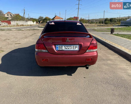 Червоний Міцубісі Lancer, об'ємом двигуна 1.58 л та пробігом 290 тис. км за 4350 $, фото 6 на Automoto.ua