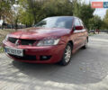 Червоний Міцубісі Lancer, об'ємом двигуна 1.58 л та пробігом 290 тис. км за 4250 $, фото 1 на Automoto.ua