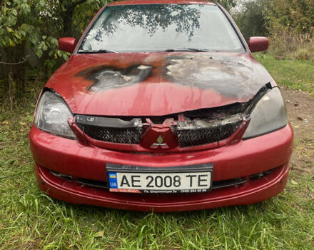 Міцубісі Lancer 2006 у Вышгороде на Automoto.ua Червоний Міцубісі Lancer, об'ємом двигуна 2 л та пробігом 320 тис. км за 2500 $, фото 2 на Automoto.ua