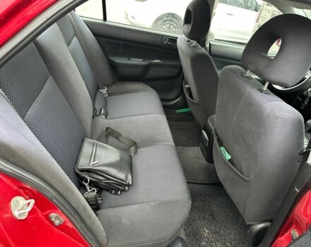 Червоний Міцубісі Lancer, об'ємом двигуна 1.6 л та пробігом 185 тис. км за 5000 $, фото 10 на Automoto.ua