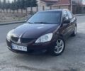 Червоний Міцубісі Lancer, об'ємом двигуна 2 л та пробігом 282 тис. км за 4150 $, фото 1 на Automoto.ua