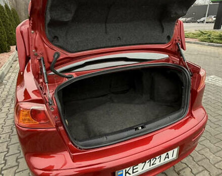 Красный Мицубиси Лансер, объемом двигателя 2 л и пробегом 261 тыс. км за 7200 $, фото 9 на Automoto.ua