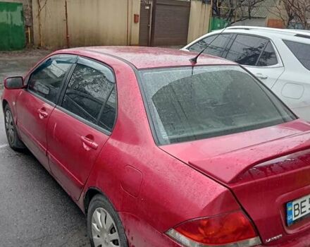 Красный Мицубиси Лансер, объемом двигателя 1.6 л и пробегом 350 тыс. км за 4650 $, фото 1 на Automoto.ua