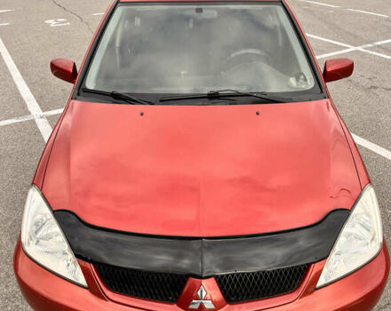 Червоний Міцубісі Lancer, об'ємом двигуна 1.6 л та пробігом 194 тис. км за 5500 $, фото 20 на Automoto.ua