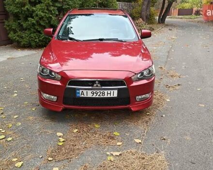 Міцубісі Lancer 2007 у Києві на Automoto.ua Червоний Міцубісі Lancer, об'ємом двигуна 2 л та пробігом 186 тис. км за 5600 $, фото 6 на Automoto.ua