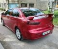 Червоний Міцубісі Lancer, об'ємом двигуна 2 л та пробігом 240 тис. км за 6300 $, фото 2 на Automoto.ua