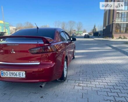 Червоний Міцубісі Lancer, об'ємом двигуна 2 л та пробігом 293 тис. км за 7350 $, фото 24 на Automoto.ua