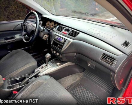 Красный Мицубиси Лансер, объемом двигателя 1.6 л и пробегом 262 тыс. км за 4699 $, фото 4 на Automoto.ua