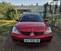 Червоний Міцубісі Lancer, об'ємом двигуна 1.6 л та пробігом 173 тис. км за 5500 $, фото 4 на Automoto.ua