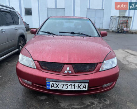 Красный Мицубиси Лансер, объемом двигателя 1.58 л и пробегом 269 тыс. км за 3899 $, фото 2 на Automoto.ua