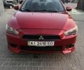 Красный Мицубиси Лансер, объемом двигателя 2 л и пробегом 240 тыс. км за 5722 $, фото 1 на Automoto.ua