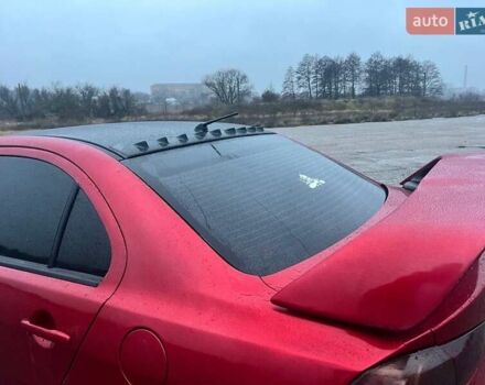 Красный Мицубиси Лансер, объемом двигателя 1.5 л и пробегом 241 тыс. км за 5850 $, фото 15 на Automoto.ua