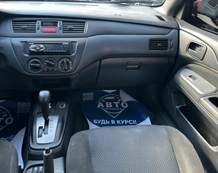 Червоний Міцубісі Lancer, об'ємом двигуна 1.6 л та пробігом 230 тис. км за 5300 $, фото 7 на Automoto.ua