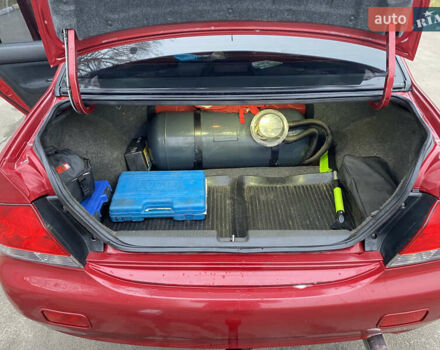 Червоний Міцубісі Lancer, об'ємом двигуна 1.58 л та пробігом 151 тис. км за 5600 $, фото 15 на Automoto.ua