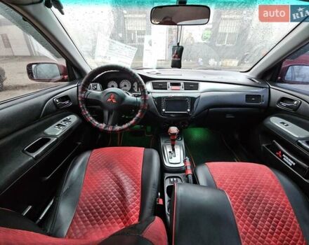 Червоний Міцубісі Lancer, об'ємом двигуна 1.6 л та пробігом 267 тис. км за 2999 $, фото 12 на Automoto.ua