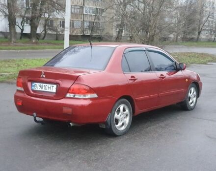 Красный Мицубиси Лансер, объемом двигателя 1.6 л и пробегом 250 тыс. км за 3700 $, фото 4 на Automoto.ua