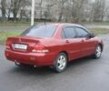 Красный Мицубиси Лансер, объемом двигателя 1.6 л и пробегом 250 тыс. км за 3700 $, фото 4 на Automoto.ua