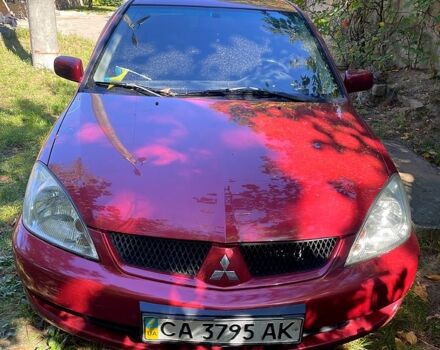 Красный Мицубиси Лансер, объемом двигателя 1.6 л и пробегом 344 тыс. км за 4000 $, фото 8 на Automoto.ua