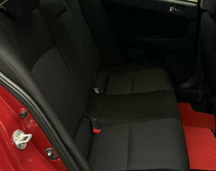 Красный Мицубиси Лансер, объемом двигателя 2 л и пробегом 261 тыс. км за 7200 $, фото 14 на Automoto.ua