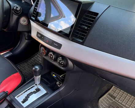 Красный Мицубиси Лансер, объемом двигателя 1.5 л и пробегом 145 тыс. км за 6500 $, фото 9 на Automoto.ua