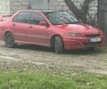 Красный Мицубиси Лансер, объемом двигателя 1.58 л и пробегом 220 тыс. км за 4500 $, фото 1 на Automoto.ua