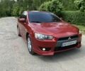 Червоний Міцубісі Lancer, об'ємом двигуна 2 л та пробігом 196 тис. км за 4600 $, фото 1 на Automoto.ua