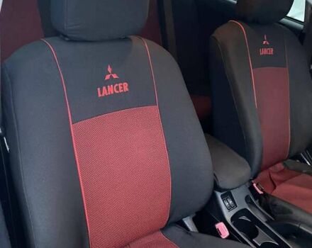 Червоний Міцубісі Lancer, об'ємом двигуна 2 л та пробігом 171 тис. км за 7500 $, фото 6 на Automoto.ua