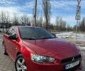 Червоний Міцубісі Lancer, об'ємом двигуна 2 л та пробігом 261 тис. км за 6850 $, фото 1 на Automoto.ua