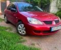 Червоний Міцубісі Lancer, об'ємом двигуна 1.6 л та пробігом 185 тис. км за 3900 $, фото 1 на Automoto.ua