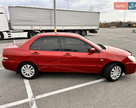 Червоний Міцубісі Lancer, об'ємом двигуна 1.6 л та пробігом 194 тис. км за 5500 $, фото 2 на Automoto.ua