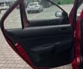 Красный Мицубиси Лансер, объемом двигателя 1.6 л и пробегом 176 тыс. км за 4300 $, фото 22 на Automoto.ua