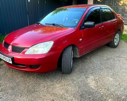 Червоний Міцубісі Lancer, об'ємом двигуна 1.6 л та пробігом 185 тис. км за 3900 $, фото 4 на Automoto.ua