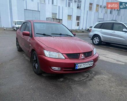 Красный Мицубиси Лансер, объемом двигателя 1.58 л и пробегом 269 тыс. км за 3899 $, фото 1 на Automoto.ua