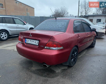 Красный Мицубиси Лансер, объемом двигателя 1.58 л и пробегом 269 тыс. км за 3899 $, фото 4 на Automoto.ua