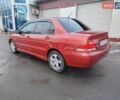 Червоний Міцубісі Lancer, об'ємом двигуна 1.6 л та пробігом 330 тис. км за 4350 $, фото 3 на Automoto.ua