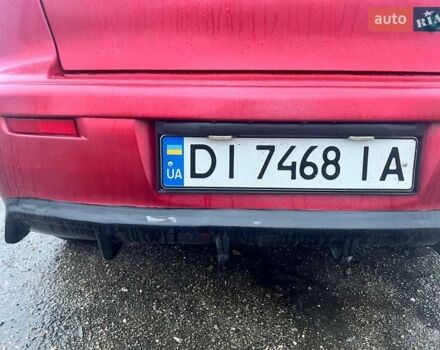 Красный Мицубиси Лансер, объемом двигателя 1.5 л и пробегом 241 тыс. км за 5850 $, фото 9 на Automoto.ua